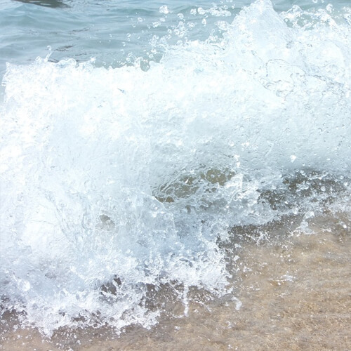 A Wave Crashing On A Beach