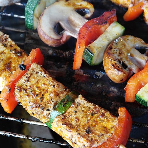 A BBQ With Meat & Vegetable Kebabs