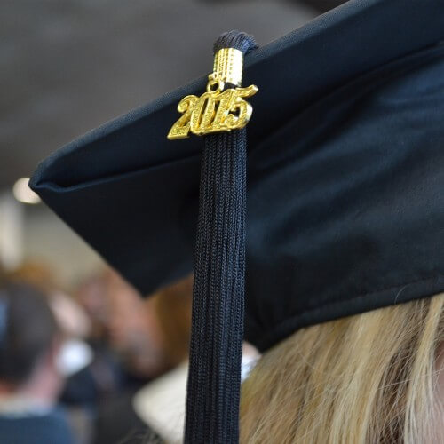 A Person Wearing A Graduation Hat With 2015 On It