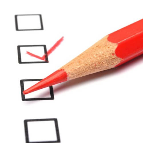A Red Pencil On Writing A Tick On A Checklist