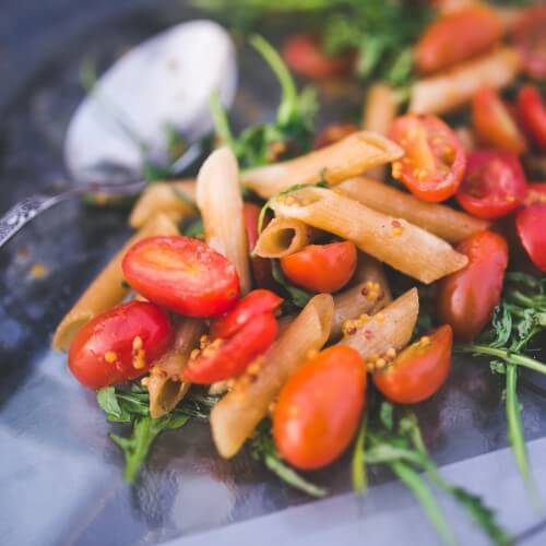 A Plate Of Rucola Pasta Salad